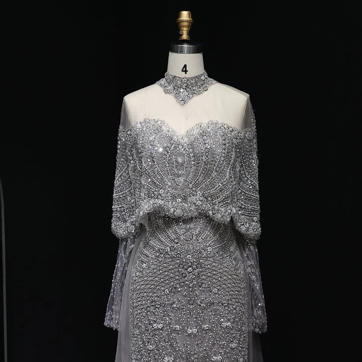 “Silver Cascade” Beaded Gown with Draped Crystal Sleeves and Matching Overlay