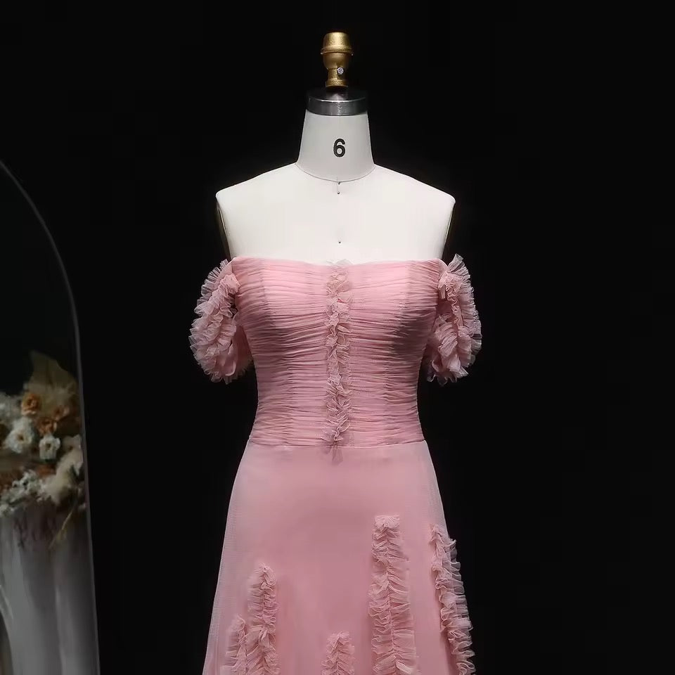 Pink tulle dress with soft pleated embroidery and feminine off-shoulder design
