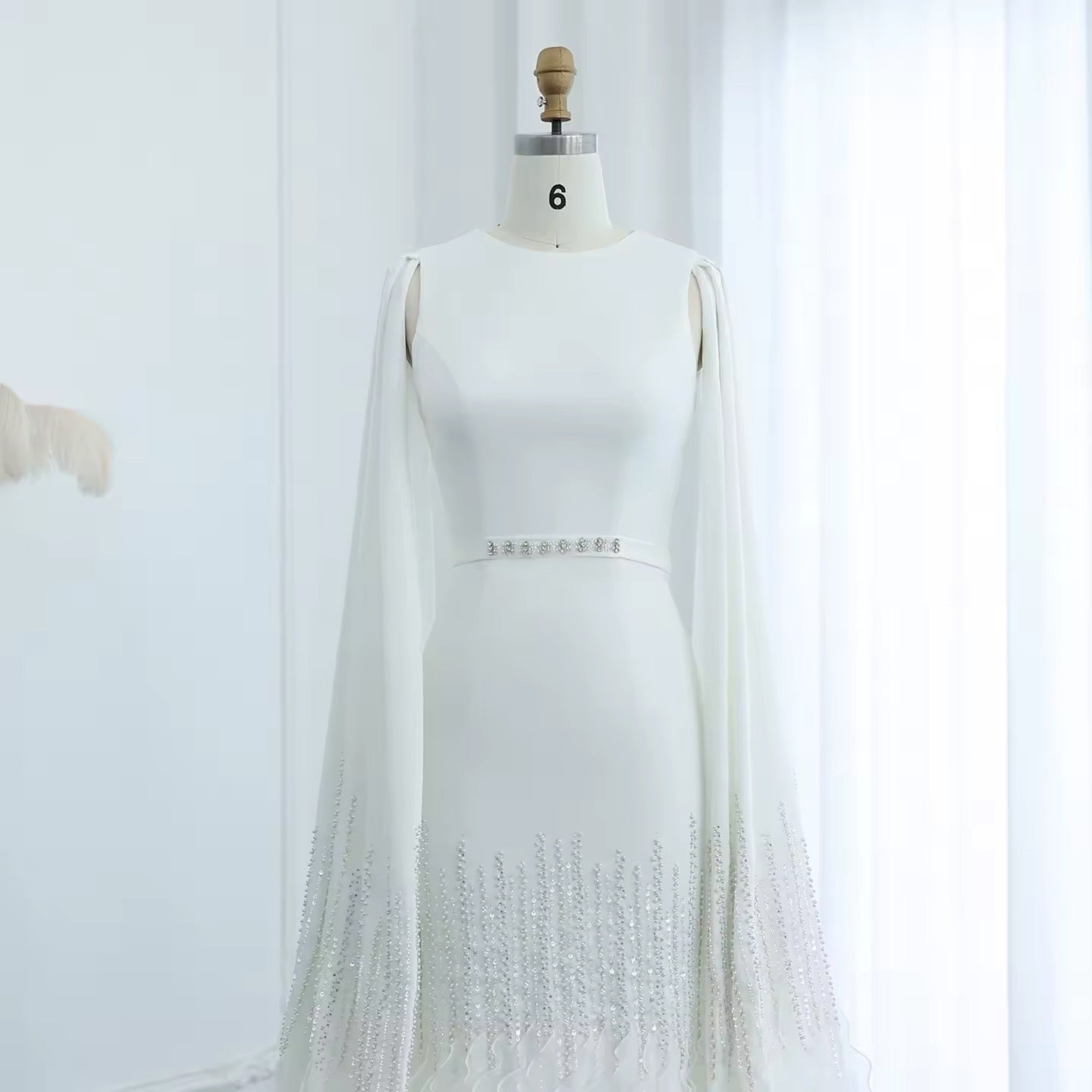 Luxury evening dress with long sleeves