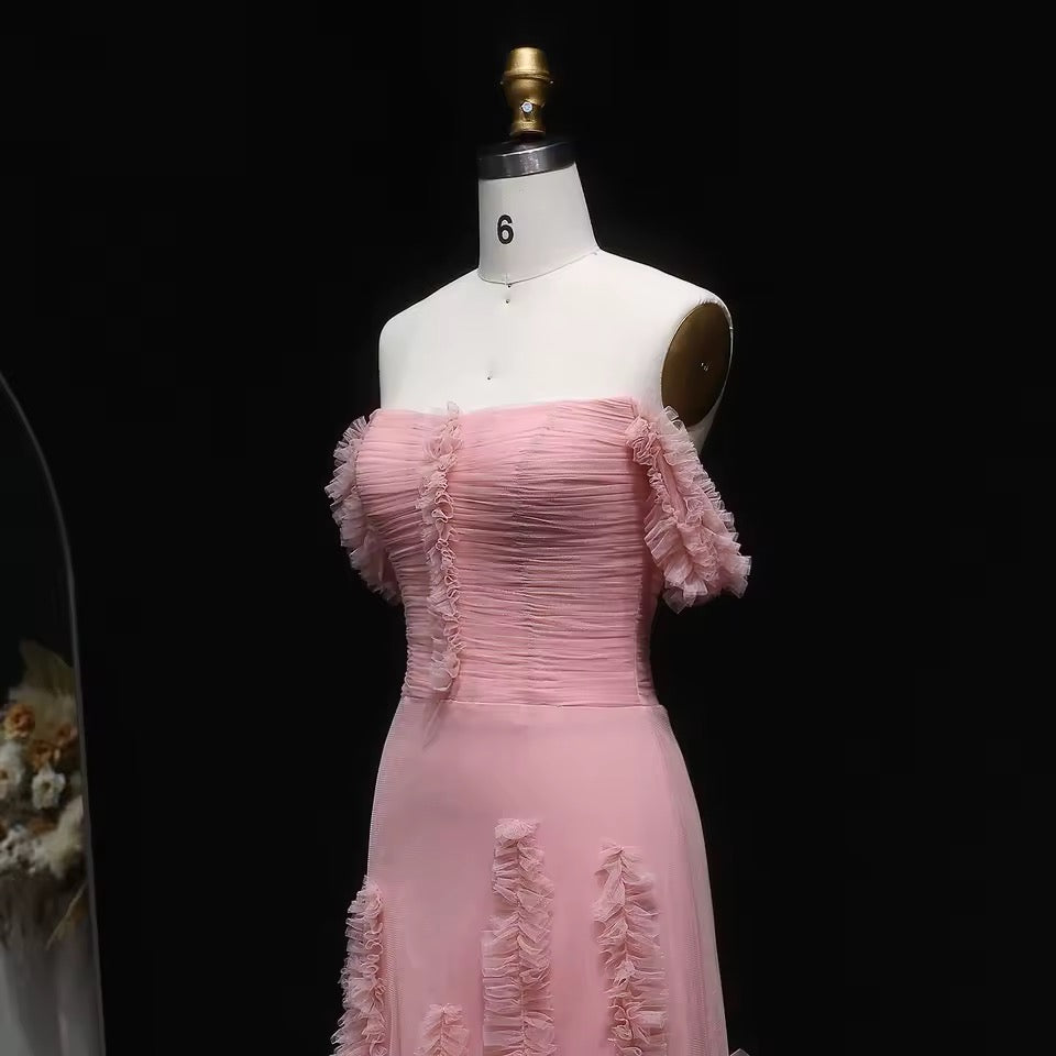 Pink tulle dress with soft pleated embroidery and feminine off-shoulder design