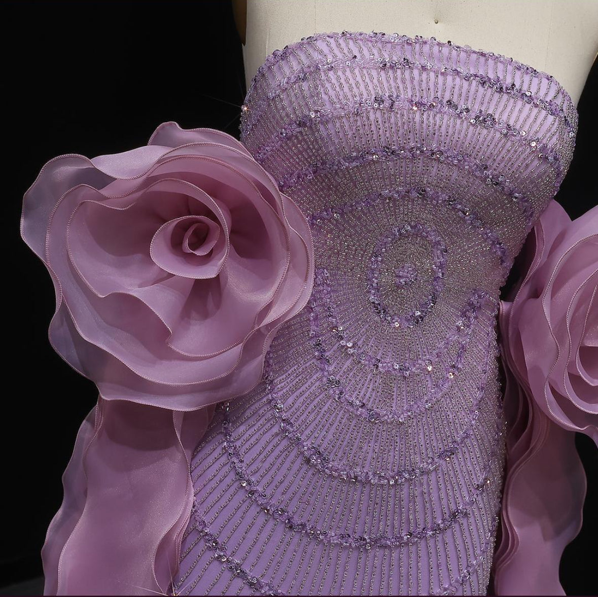 Strapless purple evening gown with 3D floral ruffles