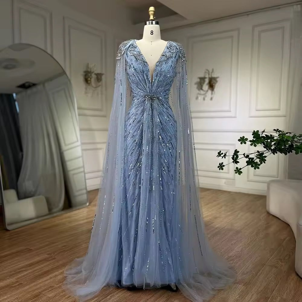 Elegant Fitted Gown with Beaded Details and Dramatic Cape