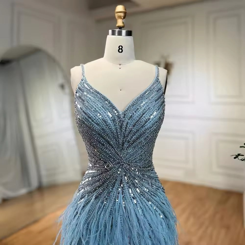 Luxury dress decorated with crystal and feathers