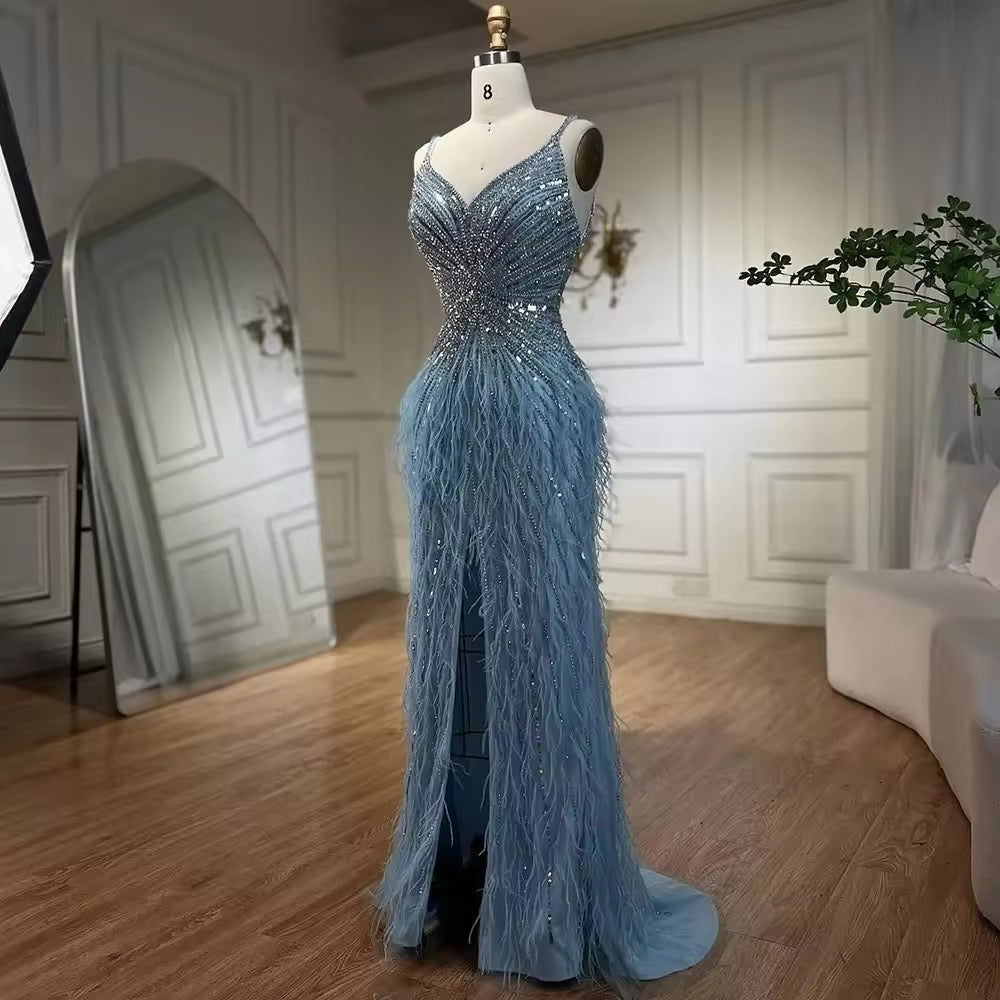 Luxury dress decorated with crystal and feathers