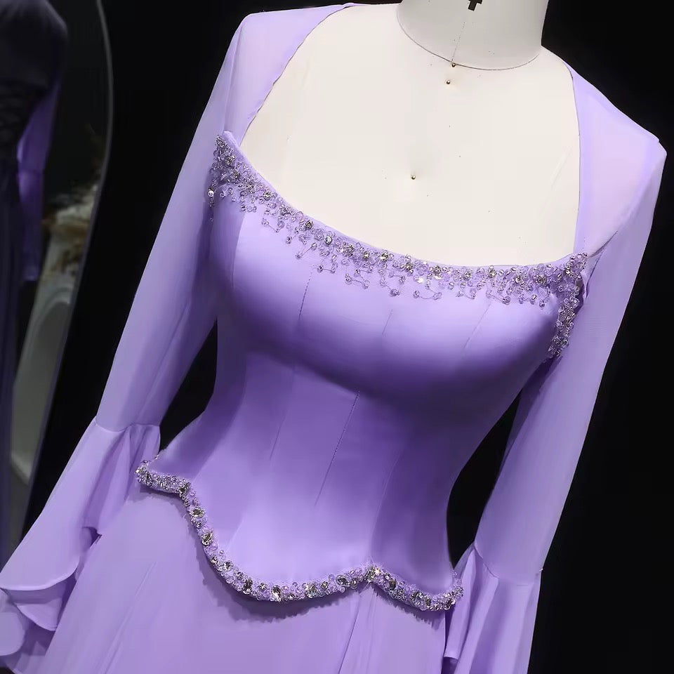 Lavender dress with flowy sleeves and soft crystal embroidery