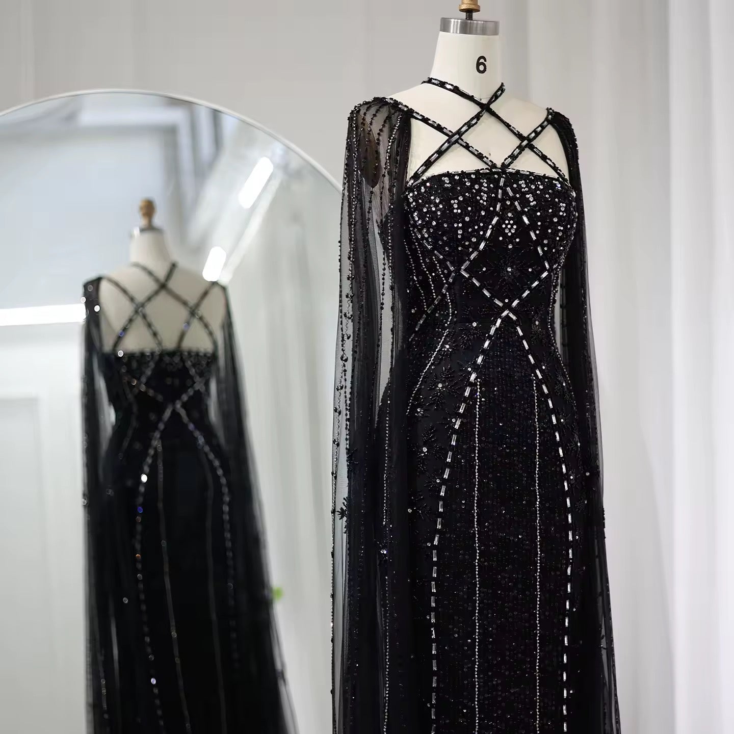 Elegant Beaded Gown with Open Sleeves and Crystal Detailing