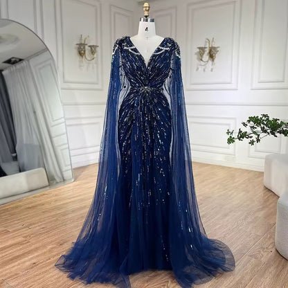 Elegant Fitted Gown with Beaded Details and Dramatic Cape