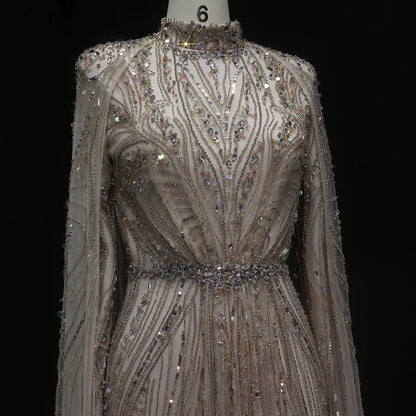 “Regal Dust” Embroidered High Neck Gown with Flowing Cape Sleeves