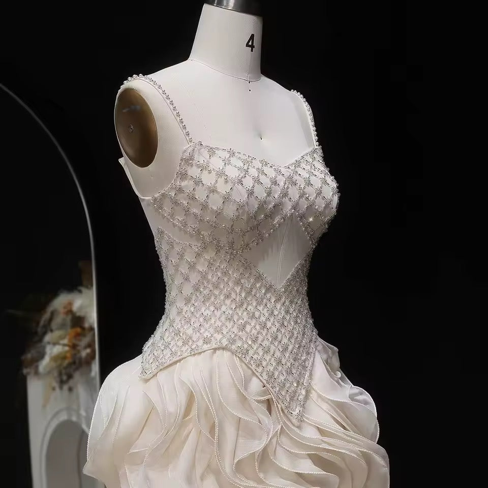 Elegant Off-White Crystal Bodice Gown with Voluminous Tulle Waves