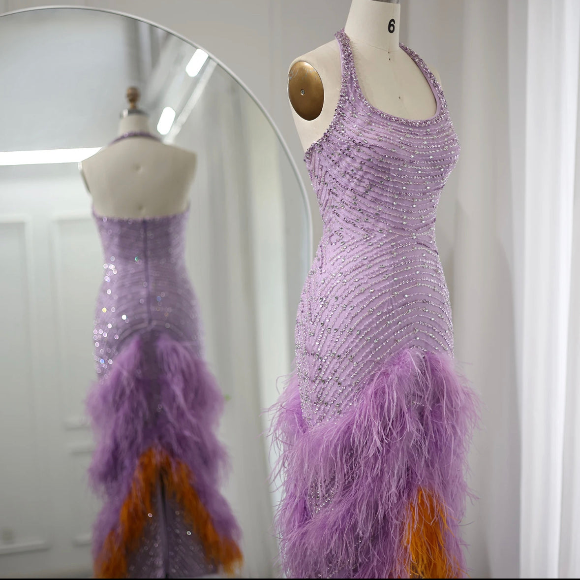 Purple dress with feathers and beads