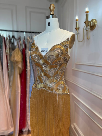 Glamorous Gold Strapless Gown with Shell-Inspired Crystals and Radiant Tassel Skirt