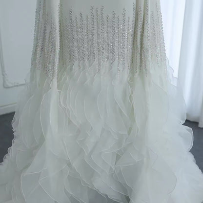 Luxury evening dress with long sleeves