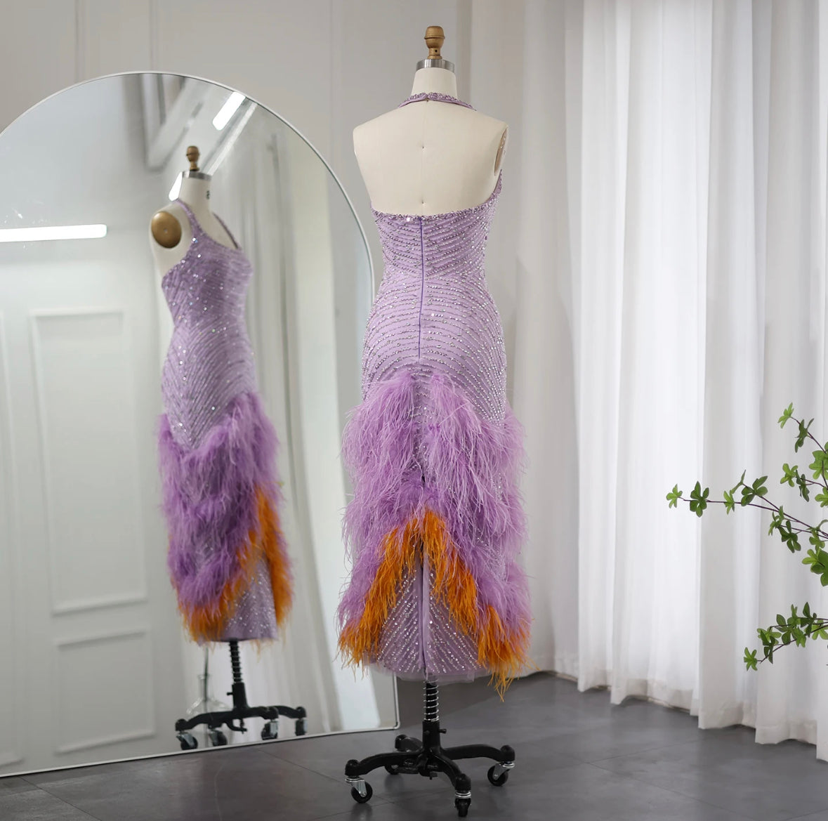 Purple dress with feathers and beads