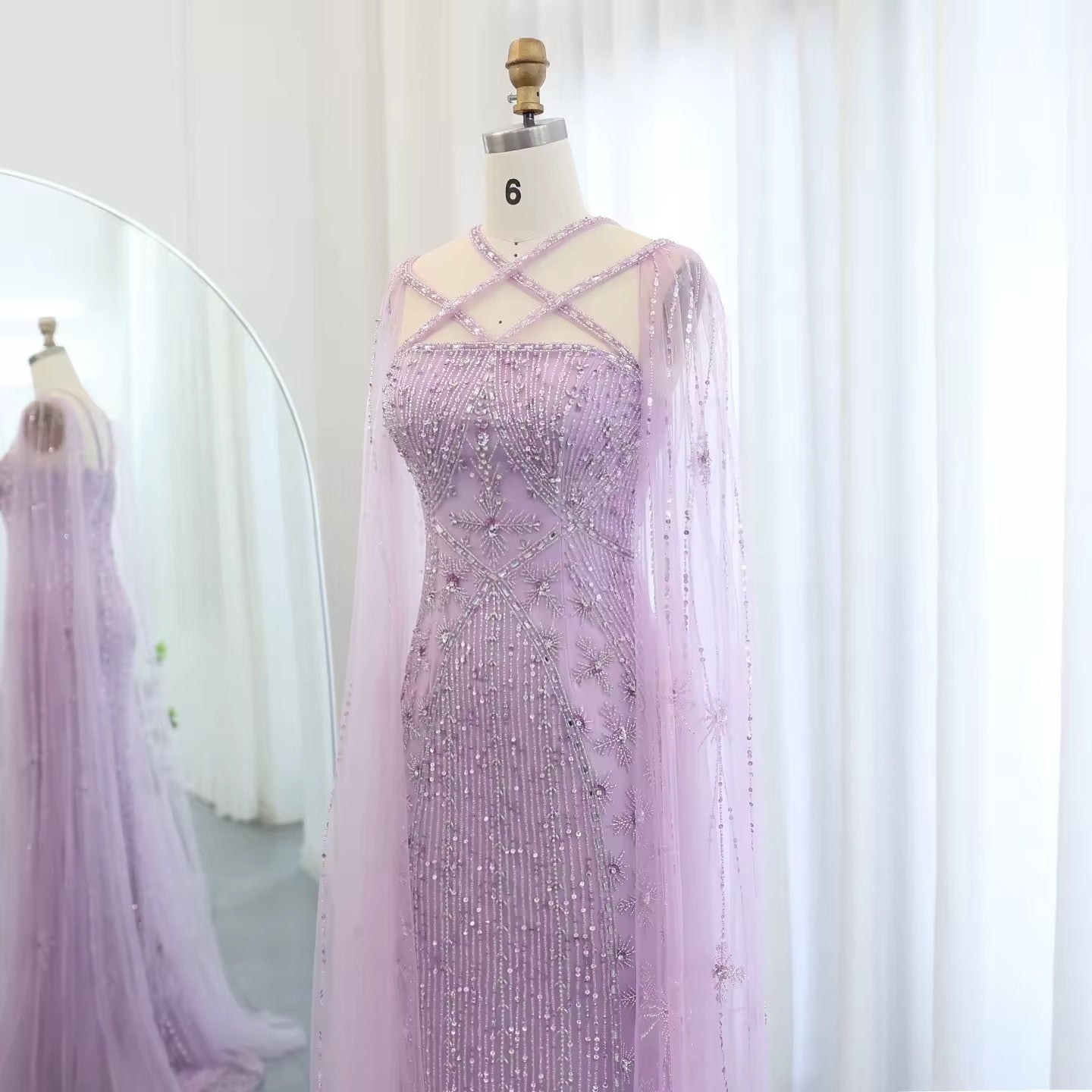 Elegant Beaded Gown with Open Sleeves and Crystal Detailing