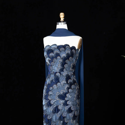 Elegant Strapless Dress with Scalloped Beadwork and Statement Cape