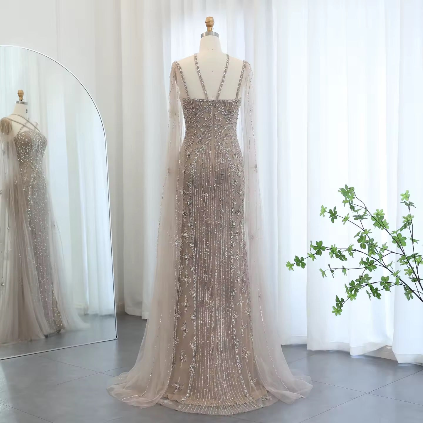 Elegant Beaded Gown with Open Sleeves and Crystal Detailing