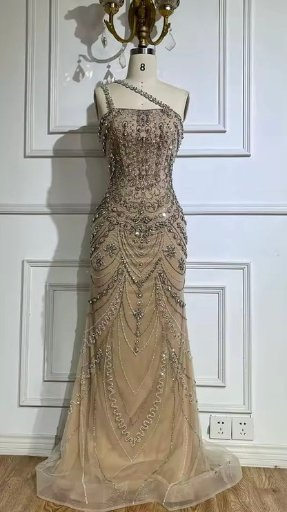 “Crystal Symphony” Gown Nude crystal-embellished evening dress with asymmetric strap