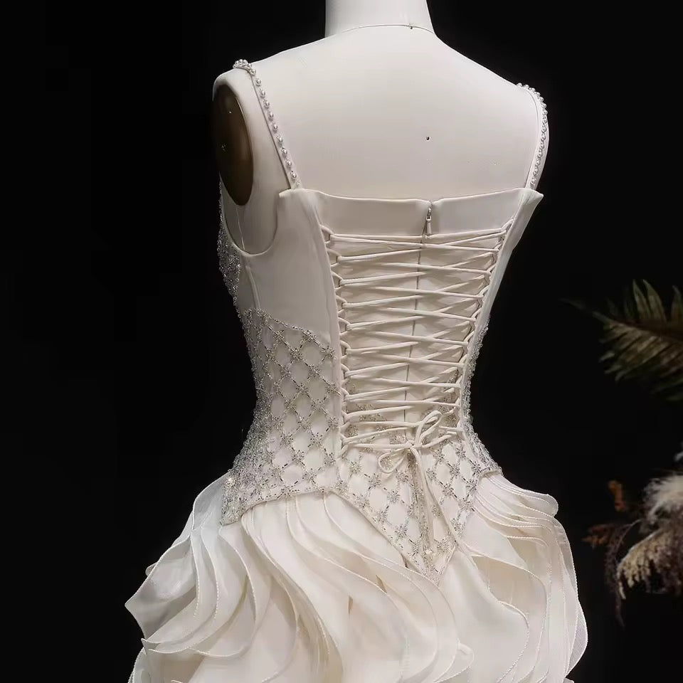 Elegant Off-White Crystal Bodice Gown with Voluminous Tulle Waves