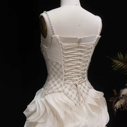 Elegant Off-White Crystal Bodice Gown with Voluminous Tulle Waves