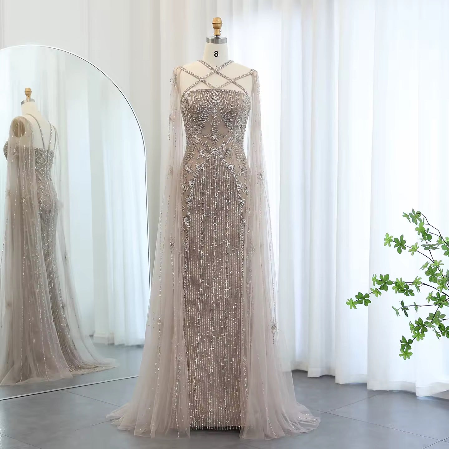 Elegant Beaded Gown with Open Sleeves and Crystal Detailing