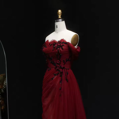 Red Evening Gown with Draped Tulle and Black Embroidery