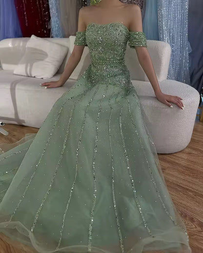 Elegant Linear Beaded Evening Dress with Sculpted Silhouette