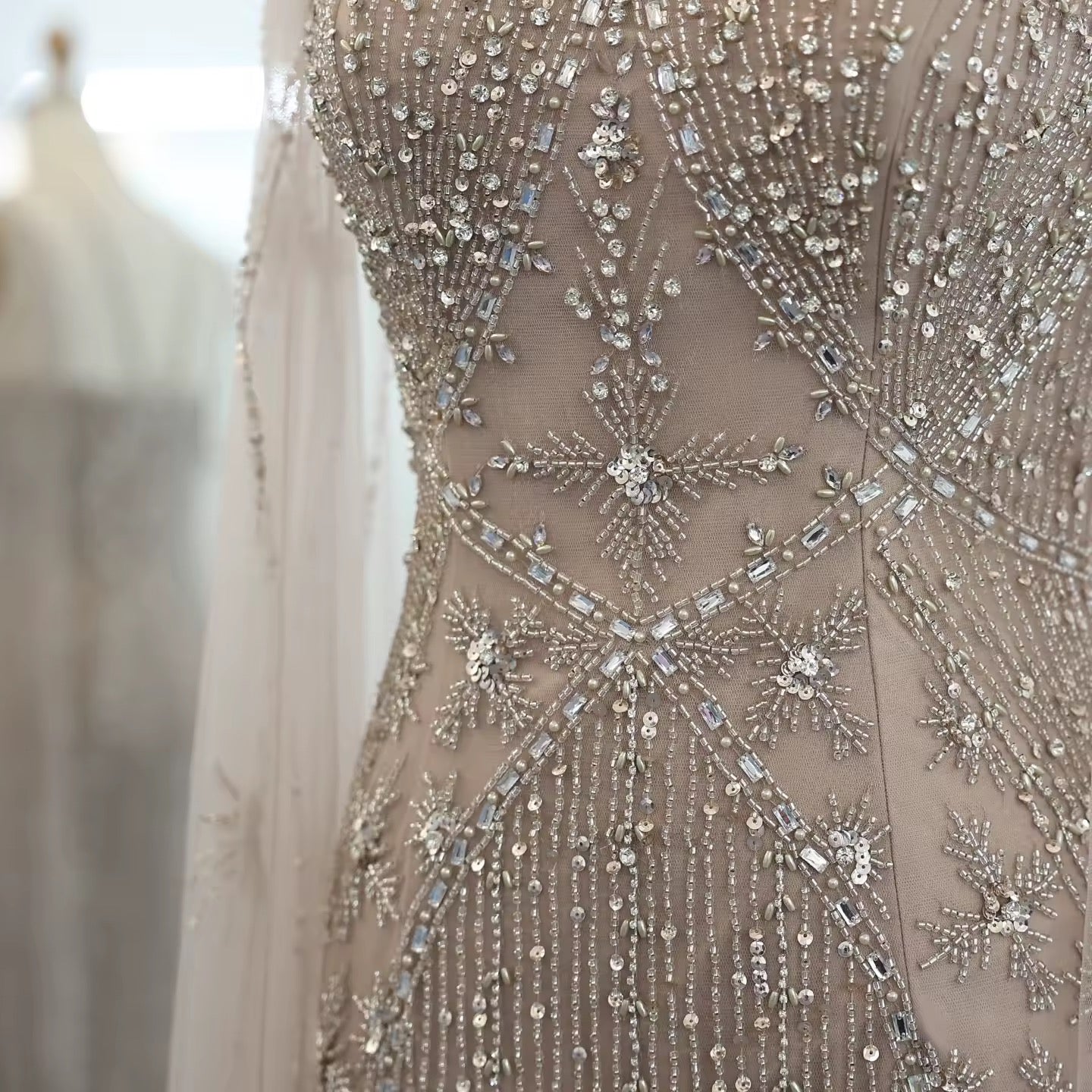 Elegant Beaded Gown with Open Sleeves and Crystal Detailing