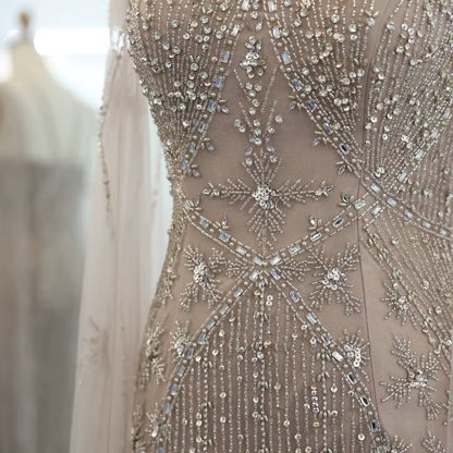 Elegant Beaded Gown with Open Sleeves and Crystal Detailing