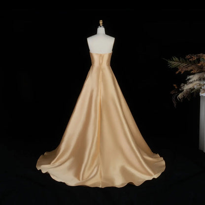 Luxury Strapless Satin Gown with Ornate Waves and Opera Gloves