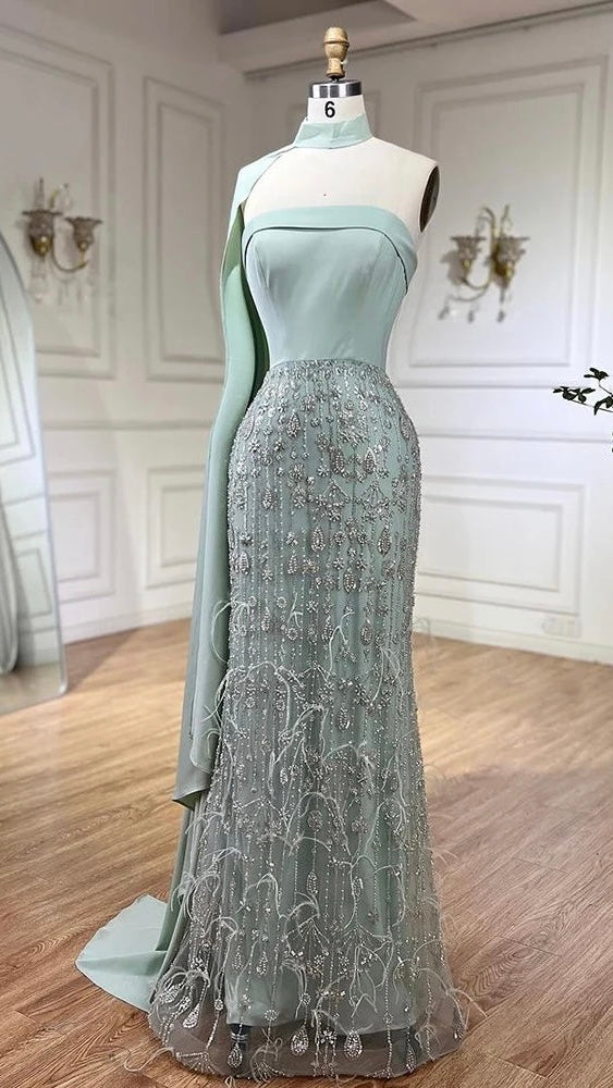 Sage Green dress decorated with feathers