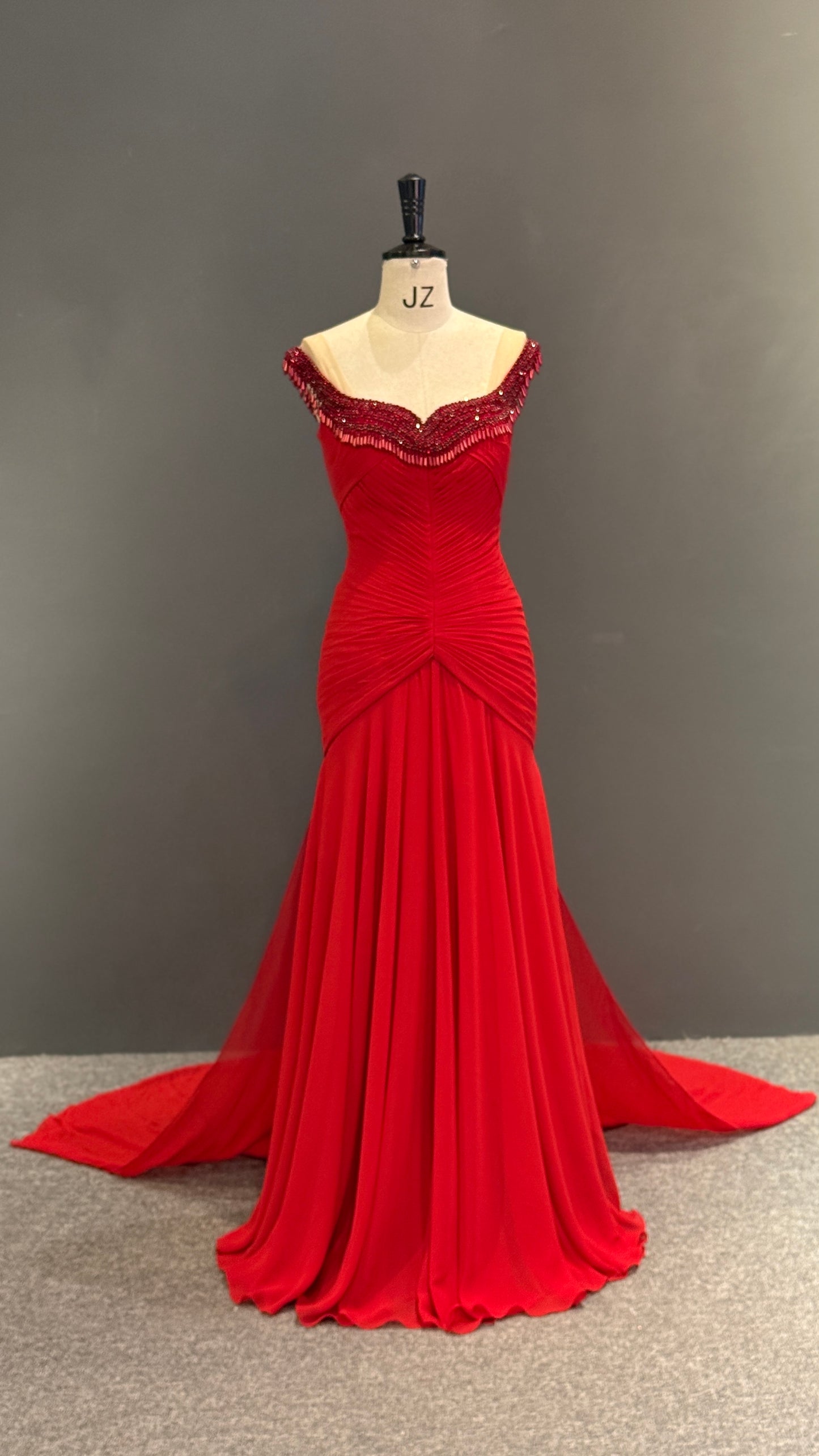 Luxury Vibrant Red Gown with Ruched Bodice and Beaded Neckline Fringe