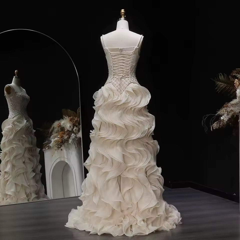 Elegant Off-White Crystal Bodice Gown with Voluminous Tulle Waves