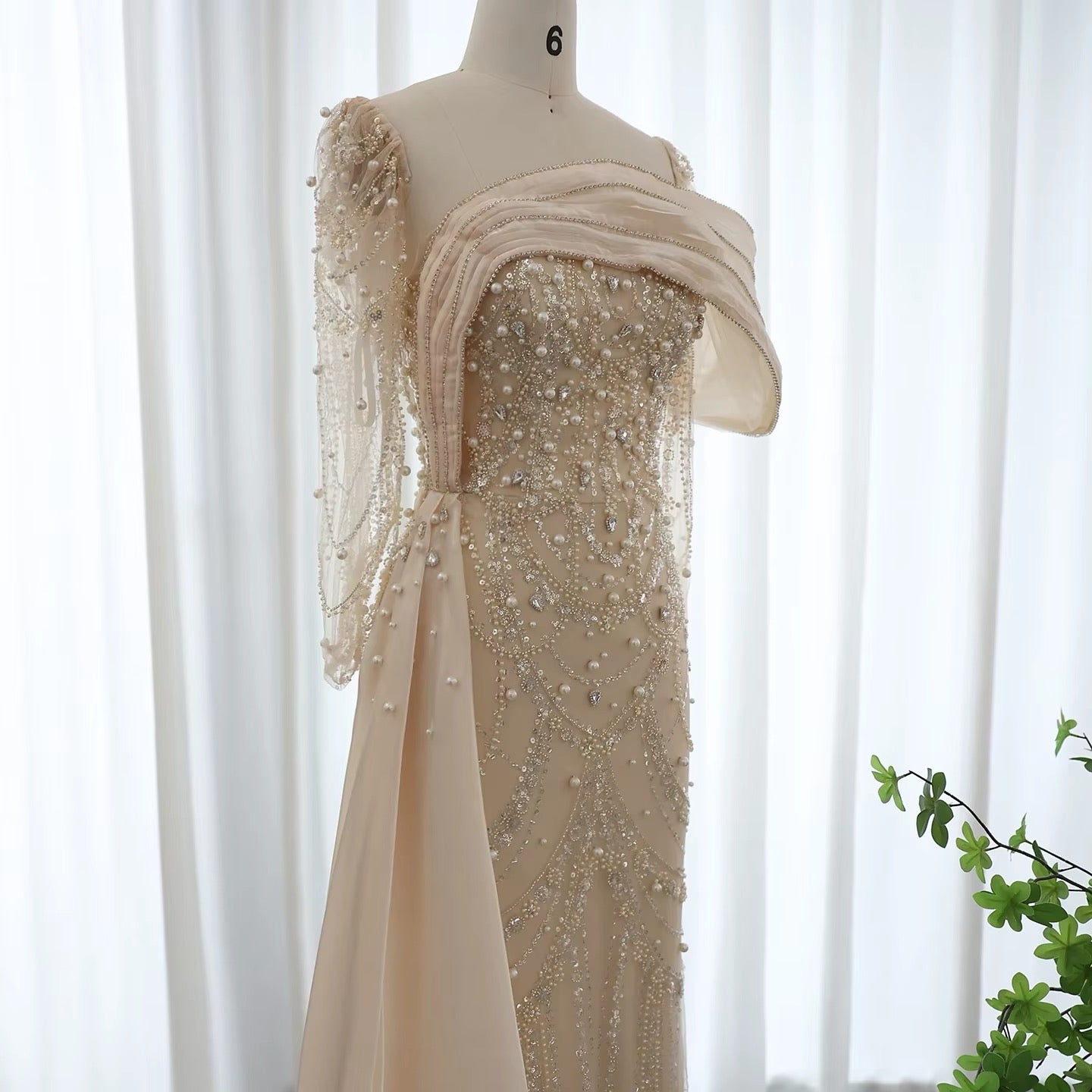 Luxury dress decorated with pearls