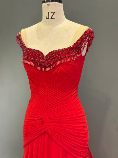 Luxury Vibrant Red Gown with Ruched Bodice and Beaded Neckline Fringe