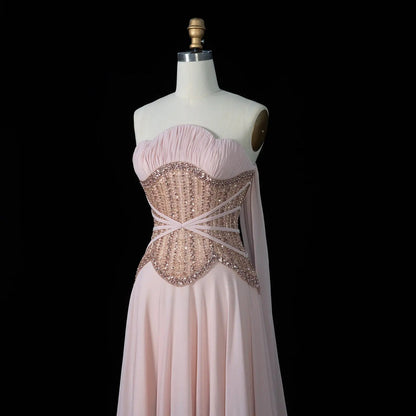 Luxury Strapless Gown with Ornate Corset-Style Waist and Dramatic Cape Scarves