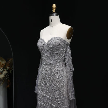 “Silver Cascade” Beaded Gown with Draped Crystal Sleeves and Matching Overlay