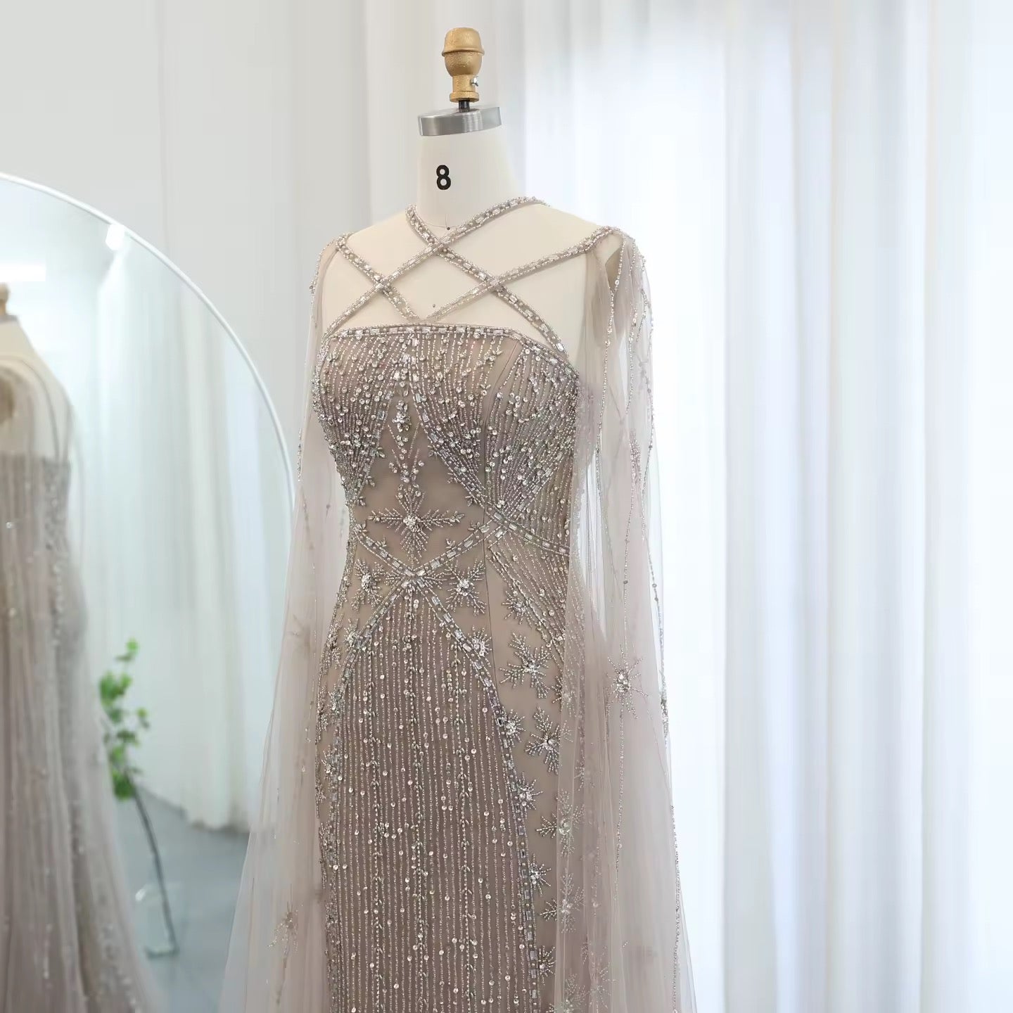 Elegant Beaded Gown with Open Sleeves and Crystal Detailing