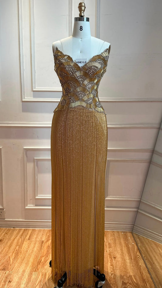 Glamorous Gold Strapless Gown with Shell-Inspired Crystals and Radiant Tassel Skirt