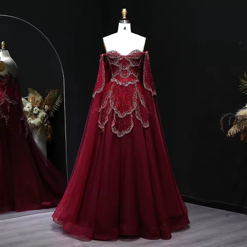 ‏Luxury Sage Green Off-Shoulder Evening Gown with Cape Sleeves