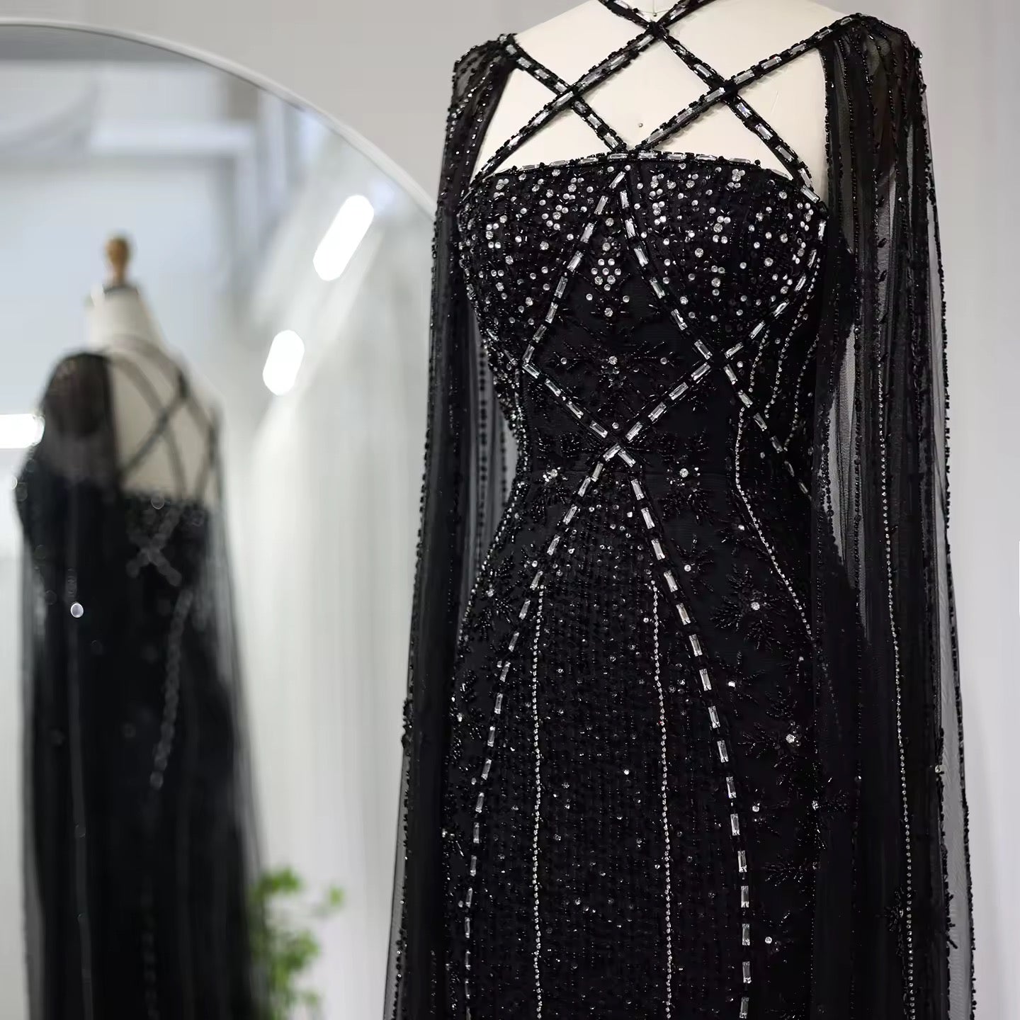 Elegant Beaded Gown with Open Sleeves and Crystal Detailing