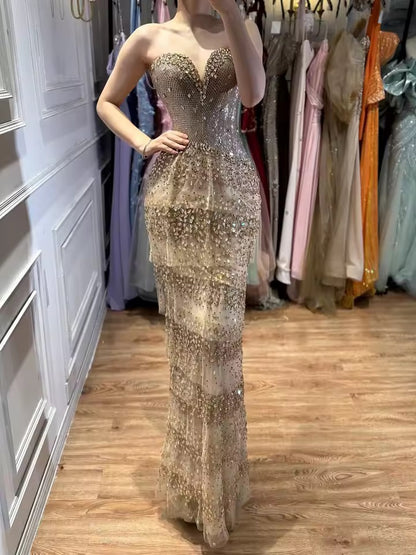 Gold Strapless Sequined Evening Gown with Tiered Crystal Drapes