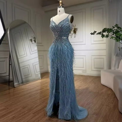 Luxury dress decorated with crystal and feathers