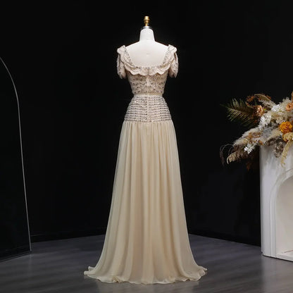 Elegant Fully Beaded Crop Top and Draped Skirt Set with Delicate Bows