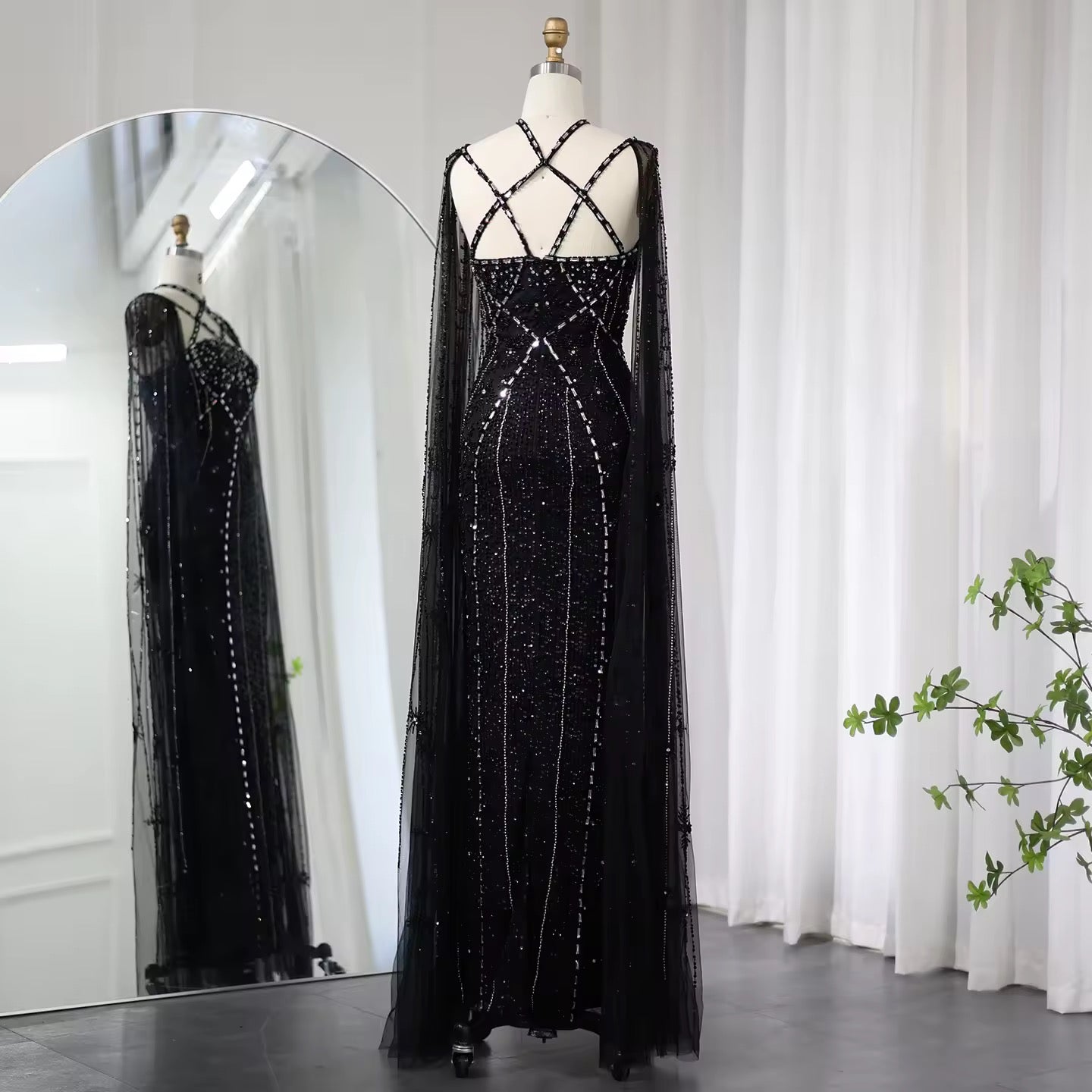 Elegant Beaded Gown with Open Sleeves and Crystal Detailing
