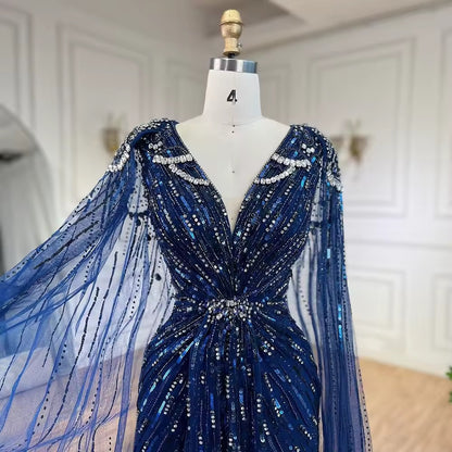Elegant Fitted Gown with Beaded Details and Dramatic Cape