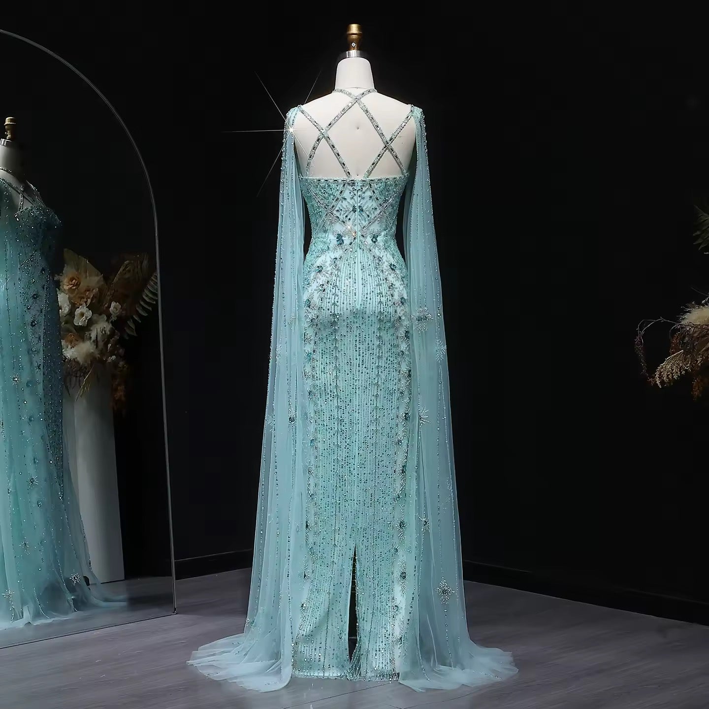 Elegant Beaded Gown with Open Sleeves and Crystal Detailing