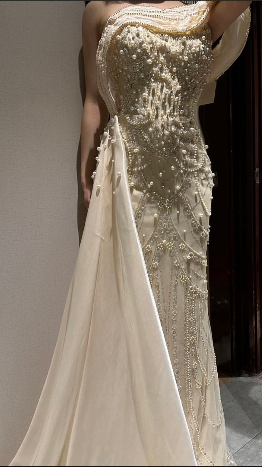 Luxury dress decorated with pearls