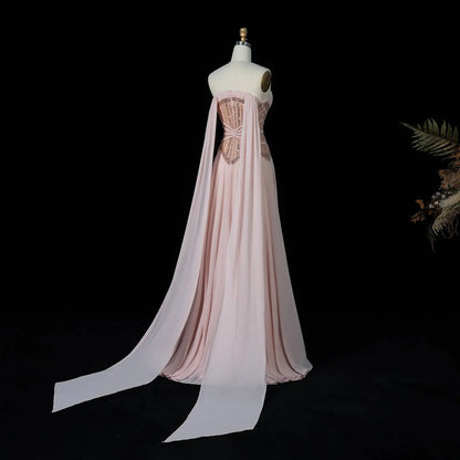 Luxury Strapless Gown with Ornate Corset-Style Waist and Dramatic Cape Scarves