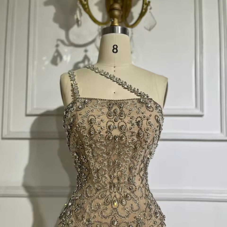 “Crystal Symphony” Gown Nude crystal-embellished evening dress with asymmetric strap