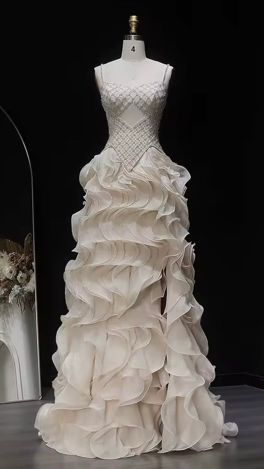 Elegant Off-White Crystal Bodice Gown with Voluminous Tulle Waves